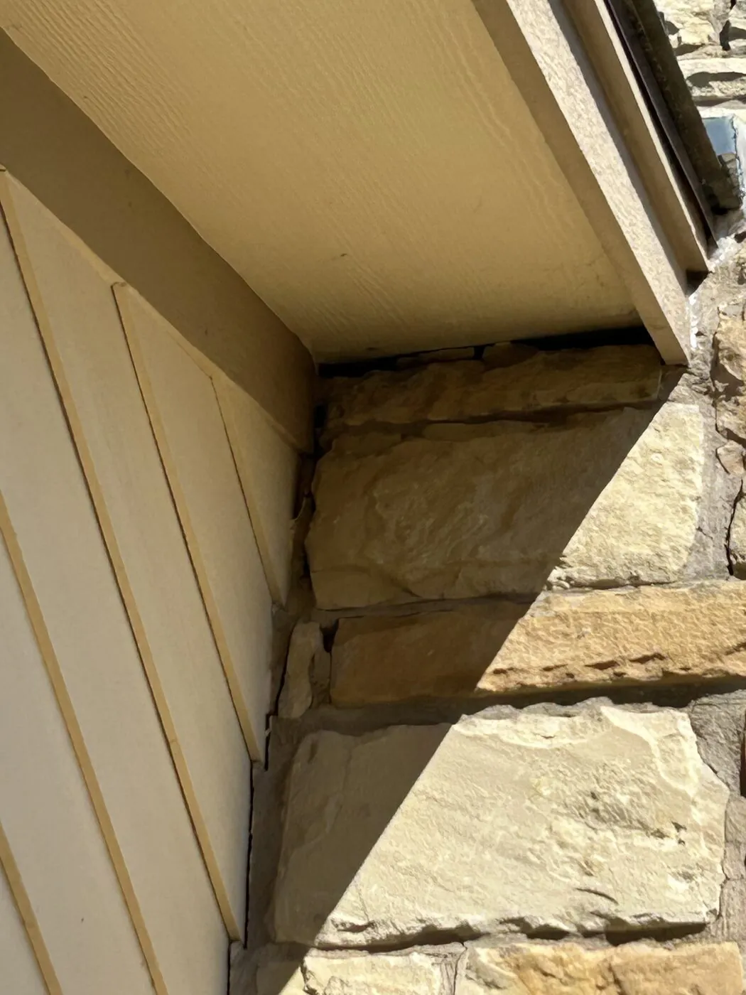 Masonry inspection — joint beneath the chimney crown