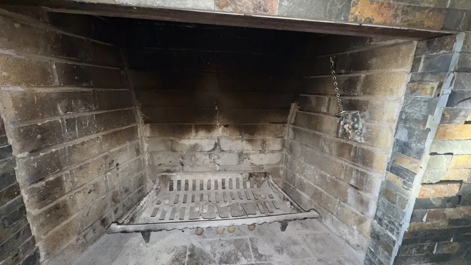 Fireplace inspection — brick firebox and grate
