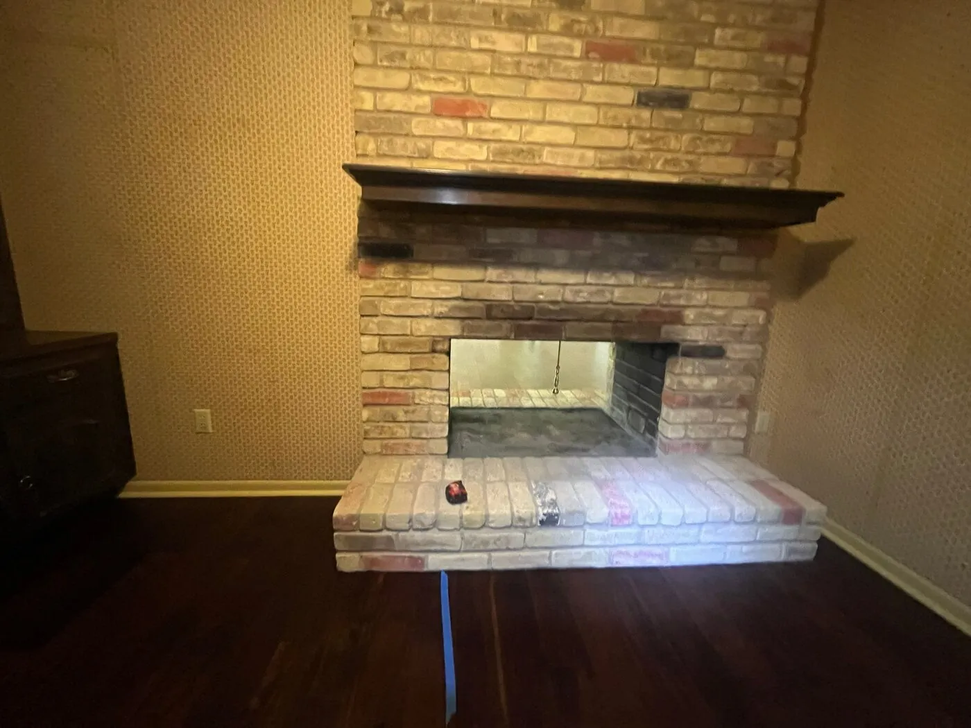 Fireplace inspection — brick surround and hearth
