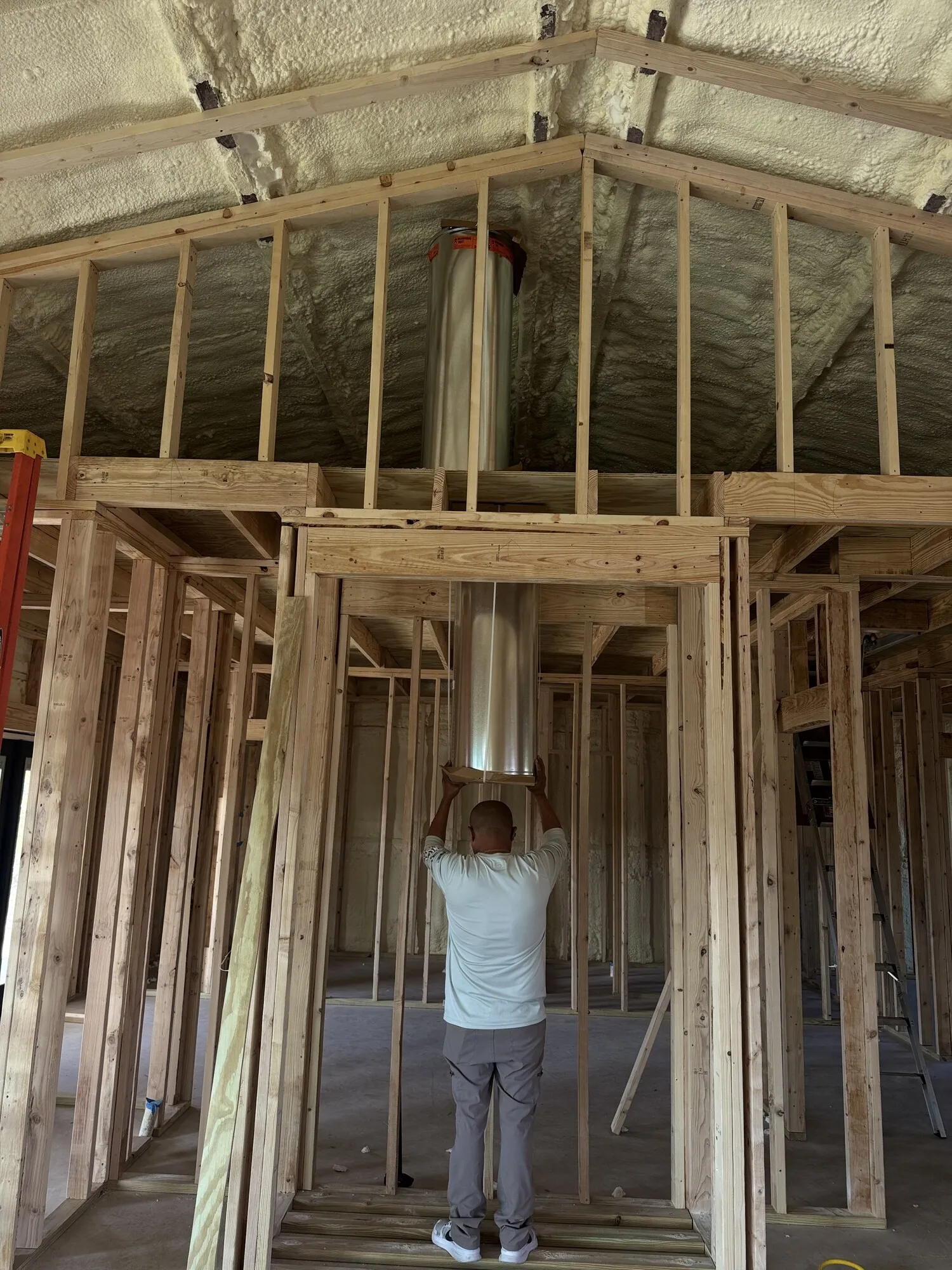 Fireplace installation — framing before enclosure