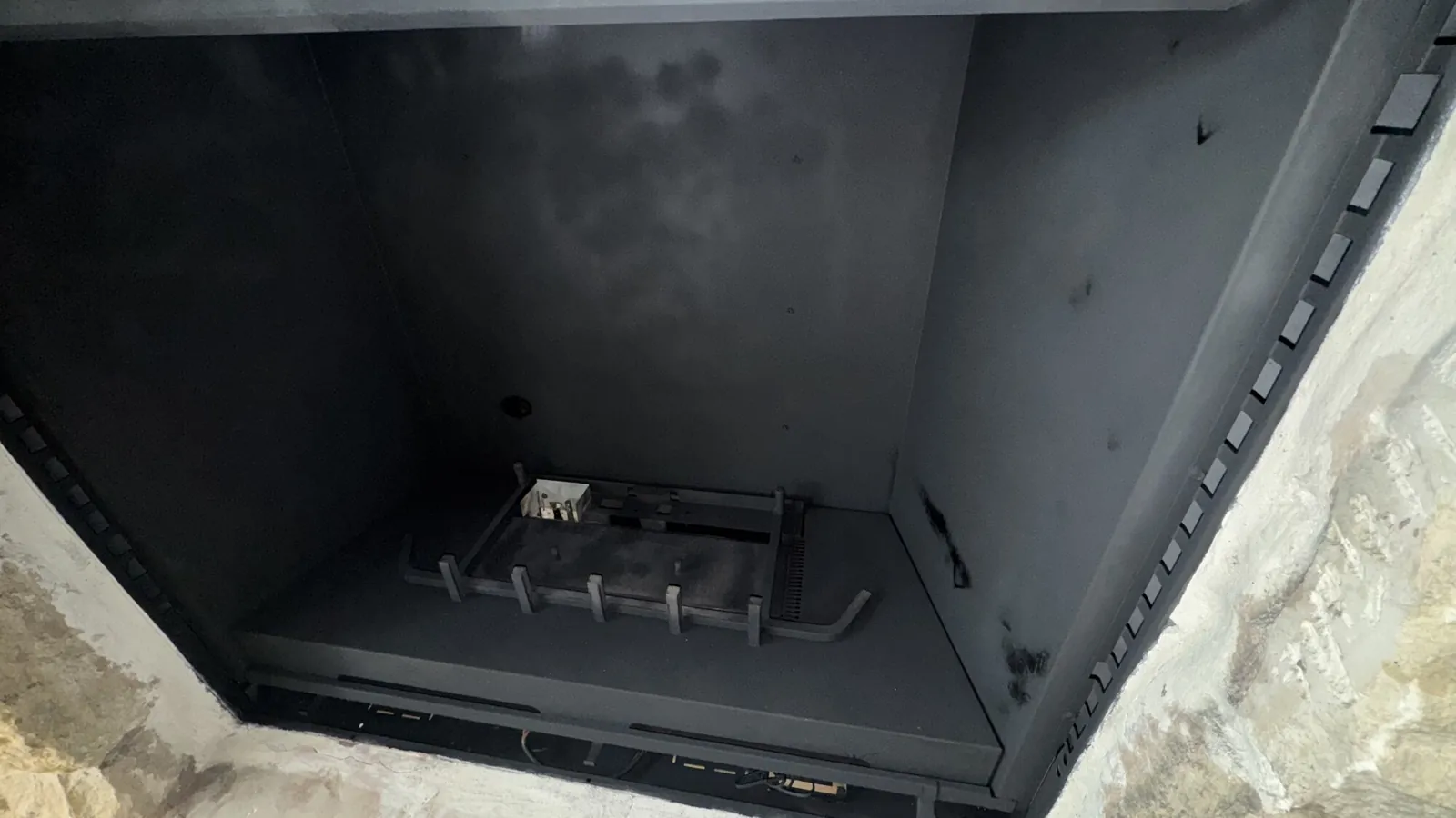 Gas fireplace service — exposed burner assembly