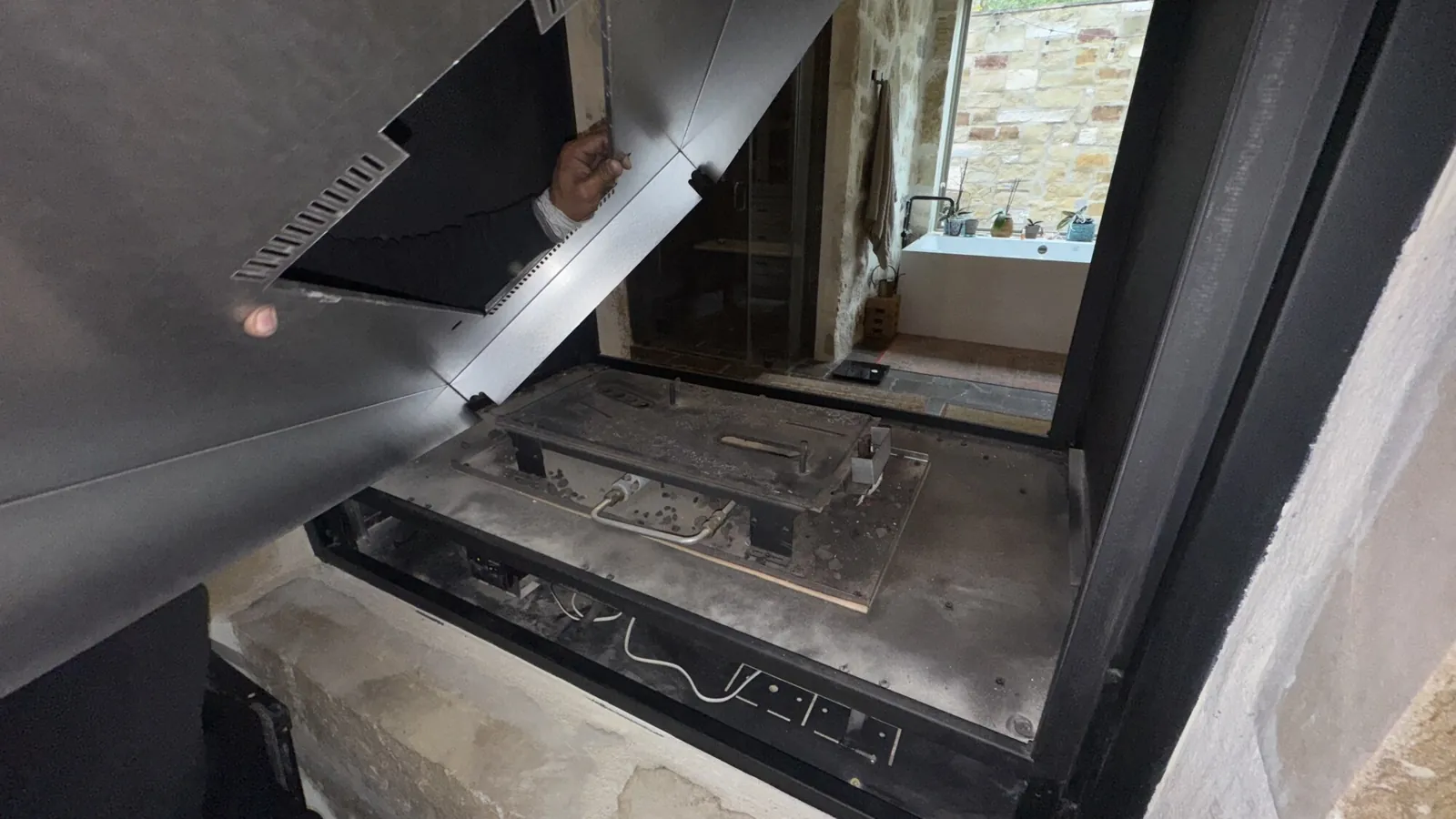 Gas fireplace service — access to the burner compartment