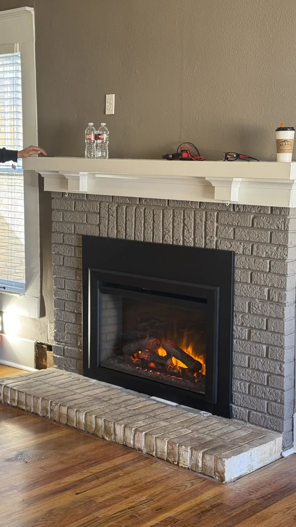 Gas fireplace service — operating fireplace in its surround