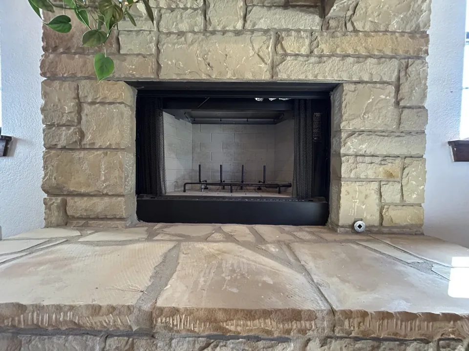 Fireplace service — limestone surround and firebox